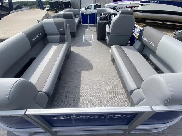 Slide: The Image of 2024 Bennington 20 SVSR-SPS boat dashboard with steering wheel and gauges. - 5