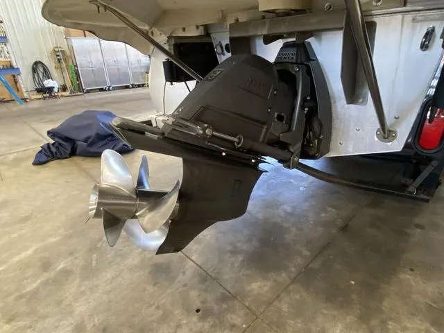 Slide: The Image of 2012 Bennington 25 RCW-I/O boat propeller and stern drive in a workshop. - 6