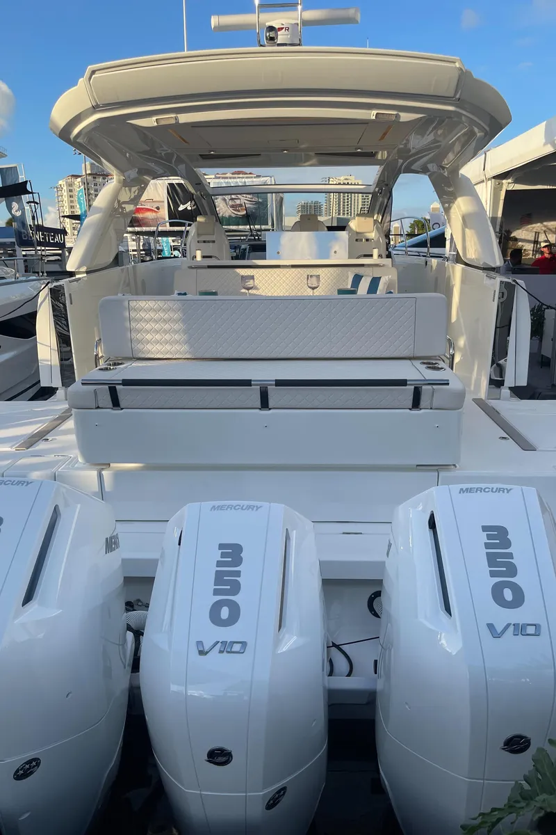 Slide: The Image of 2025 Jeanneau DB/43 OB boat with triple Mercury V10 outboard engines. - 11