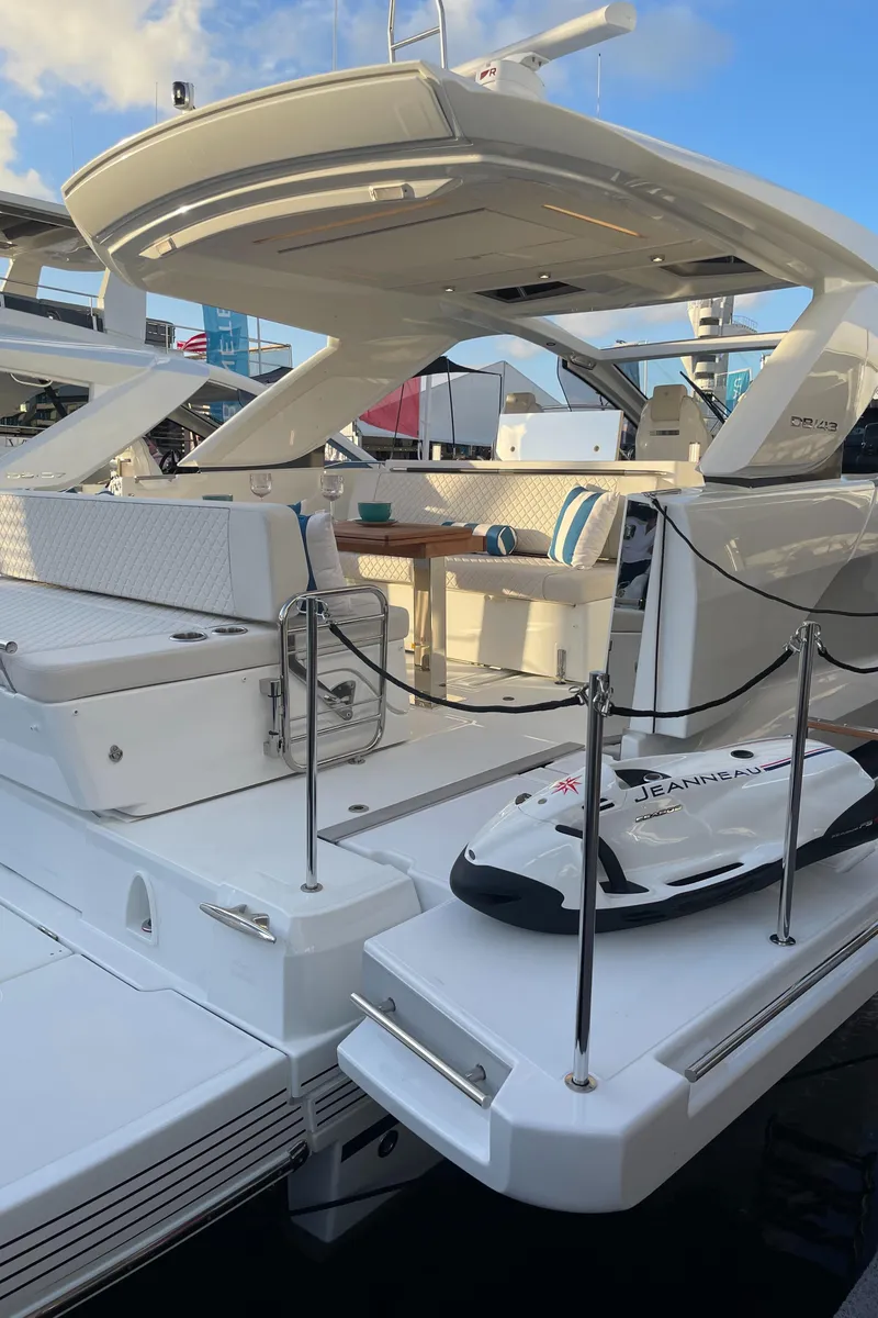 Slide: The Image of 2025 Jeanneau DB/43 OB luxury yacht with spacious deck and modern design. - 12