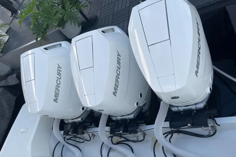 Slide: The Image of Triple Mercury outboard engines on 2025 Jeanneau DB/43 OB boat. - 14