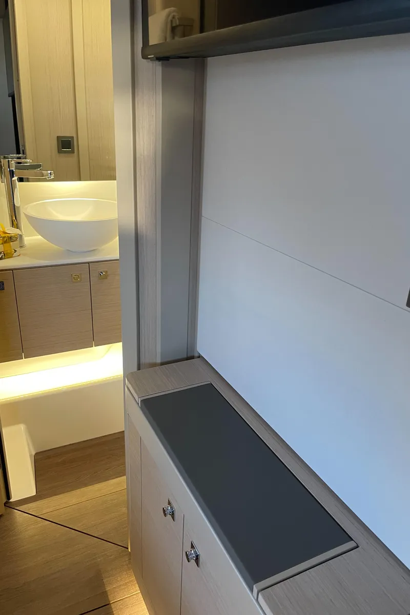 Slide: The Image of Interior of 2025 Jeanneau DB/43 OB yacht, featuring modern bathroom design. - 21