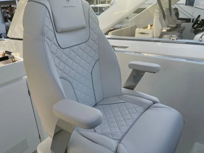 Slide: The Image of Luxurious captain's chair on 2025 Jeanneau DB/43 OB boat, featuring quilted upholstery. - 8