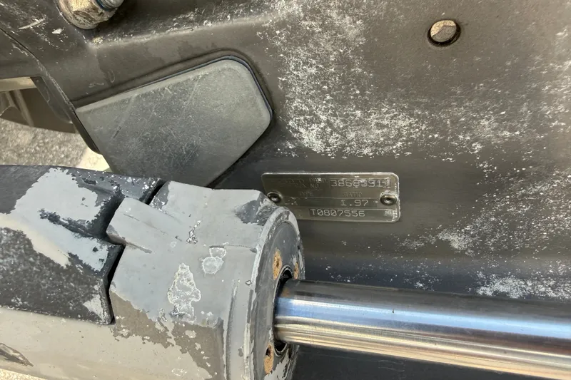 Slide: The Image of Close-up of a 1997 Four Winns 170 Horizon Ski/Fish boat engine plate. - 14