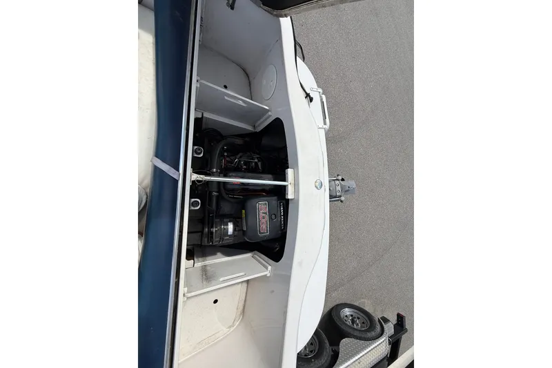 Slide: The Image of 1997 Four Winns 170 Horizon Ski/Fish boat engine compartment view. - 13