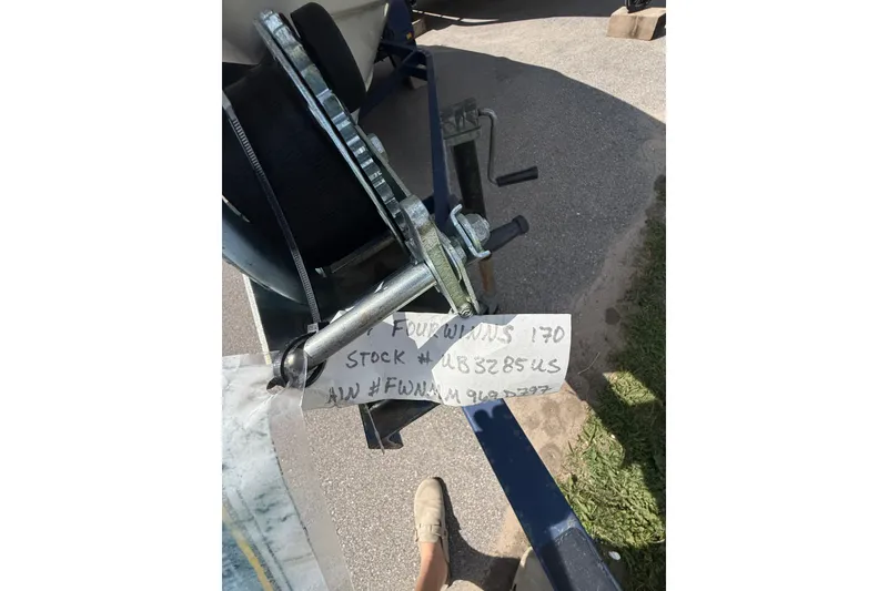 Slide: The Image of 1997 Four Winns 170 Horizon Ski/Fish boat trailer hitch with handwritten note. - 18