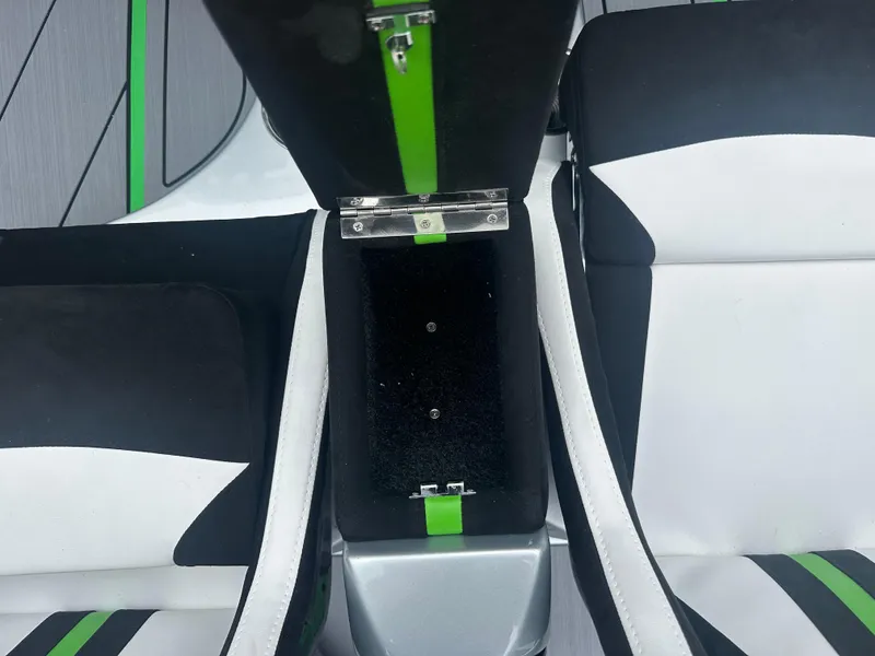 Slide: The Image of 2025 Nor-Tech 4000 Supercat interior with black, white, and green seating design. - 19