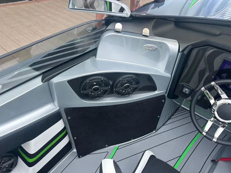 Slide: The Image of Interior of 2025 Nor-Tech 4000 Supercat with sleek design and modern audio system. - 22