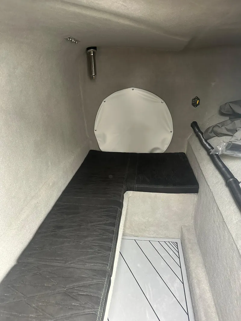 Slide: The Image of Interior cabin of 2025 Nor-Tech 4000 Supercat with black seating and modern design. - 24