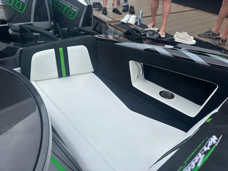 Slide: The Image of 2025 Nor-Tech 4000 Supercat interior with sleek black and white seating. - 32