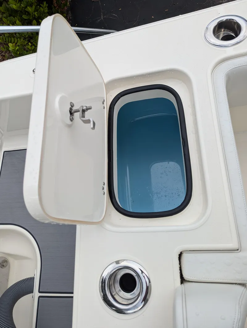 Slide: The Image of Open storage compartment on 2025 Blackwood 290LXF boat. - 23