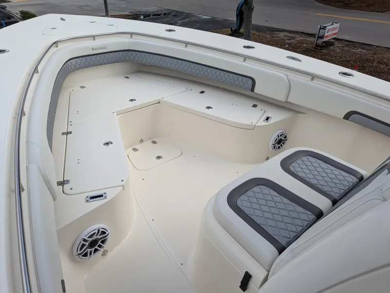 Slide: The Image of 2025 Blackwood 290LXF boat interior with cushioned seating and storage compartments. - 26