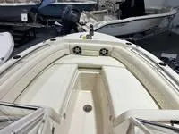 Slide: The Image of 2025 Grady-White Freedom 235 boat interior with spacious seating and modern design. - 8