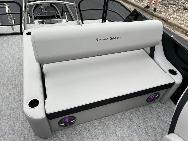 Slide: The Image of 2025 South Bay LE 222 UL boat with gray seating and cup holders. - 12