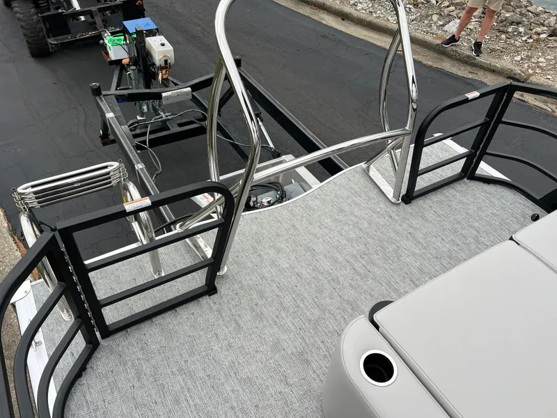 Slide: The Image of 2025 South Bay LE 222 UL pontoon boat deck with sleek railing and seating. - 14