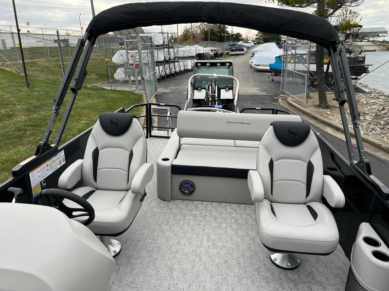 Slide: The Image of 2025 South Bay LE 222 UL pontoon boat interior with plush seating and modern design. - 9