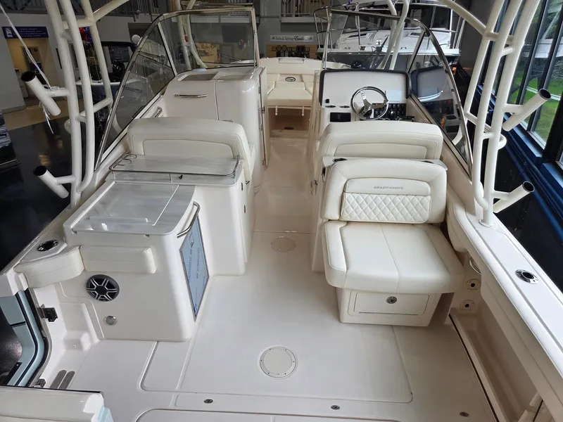 Slide: The Image of 2025 Grady-White Freedom 285 boat interior with luxurious seating and modern amenities. - 6