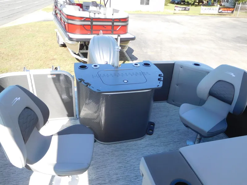 Slide: The Image of 2025 Bennington 23 SS boat interior with seating and console, showcasing modern design. - 10