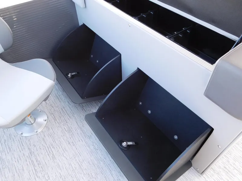 Slide: The Image of Interior of 2025 Bennington 23 SS boat with seating and storage compartments. - 9