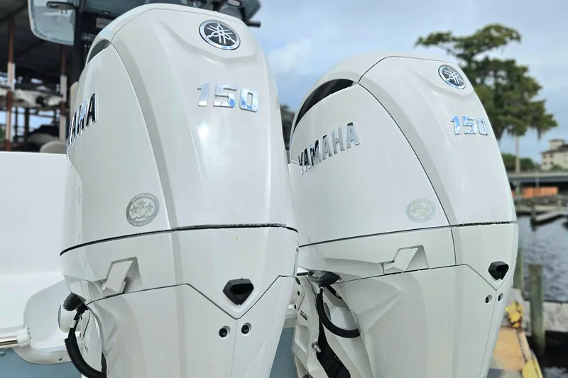 Slide: The Image of Twin Yamaha 150 outboard engines on a 2026 Sea Hunt Gamefish 25 boat. - 3