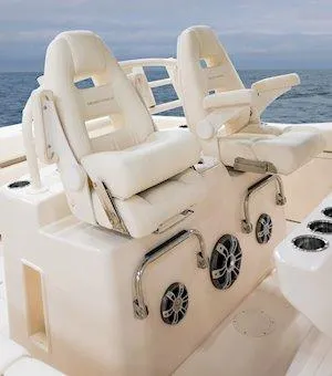 Slide: The Image of 2025 Grady-White Canyon 306 boat seats with ocean backdrop. - 7