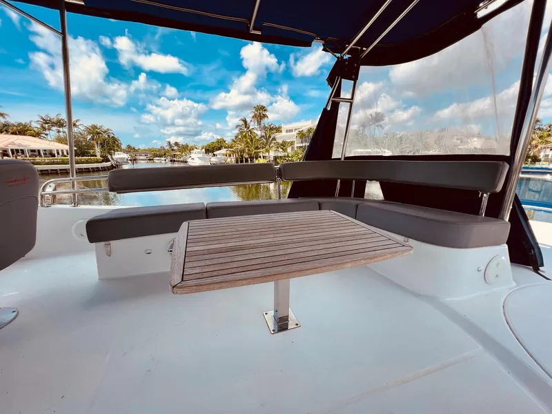 Slide: The Image of Spacious deck of 2015 Fountaine Pajot Cumberland 47 LC with seating and table. - 21