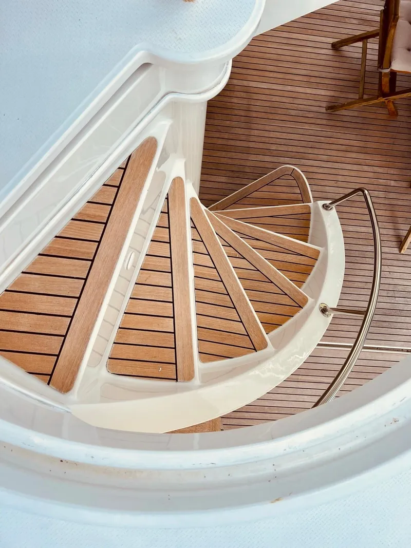 Slide: The Image of Wooden spiral staircase on 2015 Fountaine Pajot Cumberland 47 LC yacht. - 26