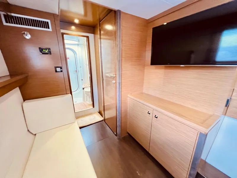 Slide: The Image of Interior of 2015 Fountaine Pajot Cumberland 47 LC yacht with modern wood finish and TV. - 49
