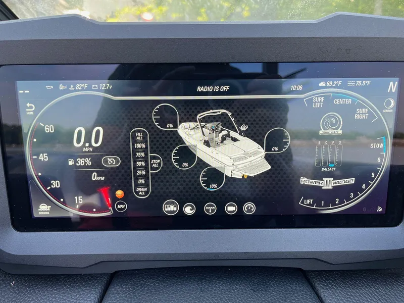 Slide: The Image of 2024 Malibu 20VTX dashboard display showing speed, fuel, and boat settings. - 15