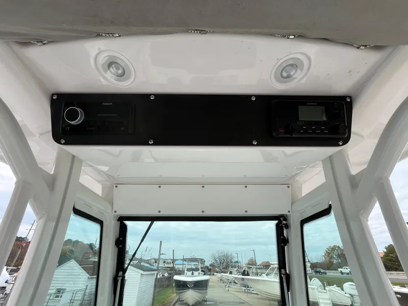 Slide: The Image of Interior view of 2022 Everglades 235 Center Console boat dashboard. - 14