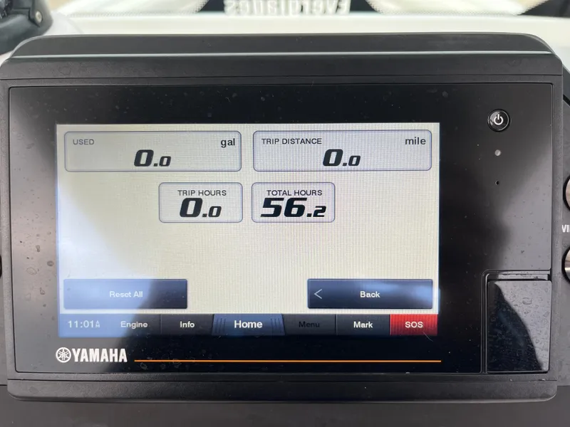 Slide: The Image of Yamaha display showing 56.2 total hours on Everglades 235 Center Console, 2022 model. - 17