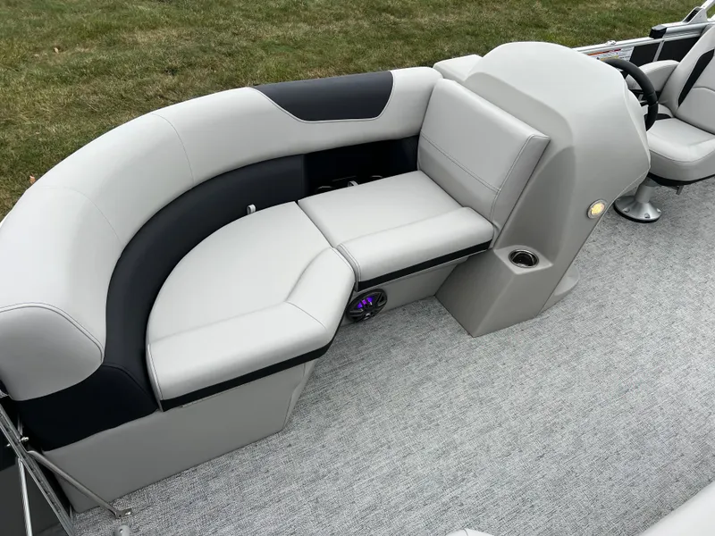 Slide: The Image of 2025 South Bay 222 RS LE pontoon boat interior with gray seating and carpet. - 10