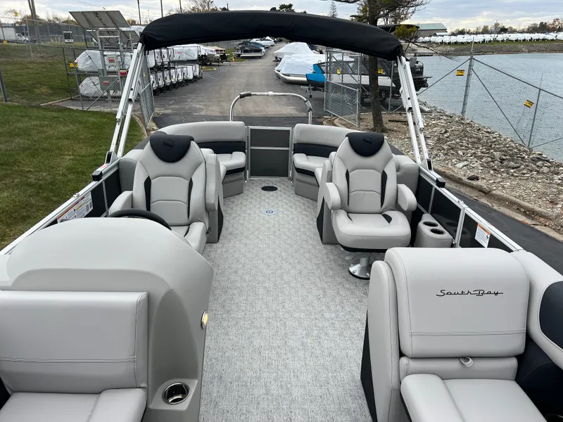 Slide: The Image of 2025 South Bay 222 RS LE pontoon boat with spacious seating and modern design. - 11