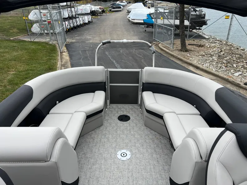 Slide: The Image of 2025 South Bay 222 RS LE pontoon boat with spacious seating and modern design. - 13