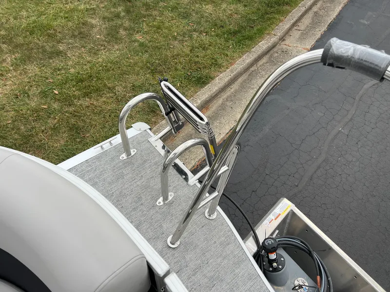 Slide: The Image of 2025 South Bay 222 RS LE boat ladder and deck detail. - 14