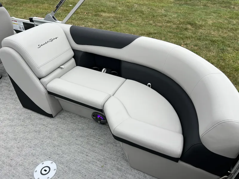Slide: The Image of 2025 South Bay 222 RS LE boat seating with gray and black upholstery. - 15