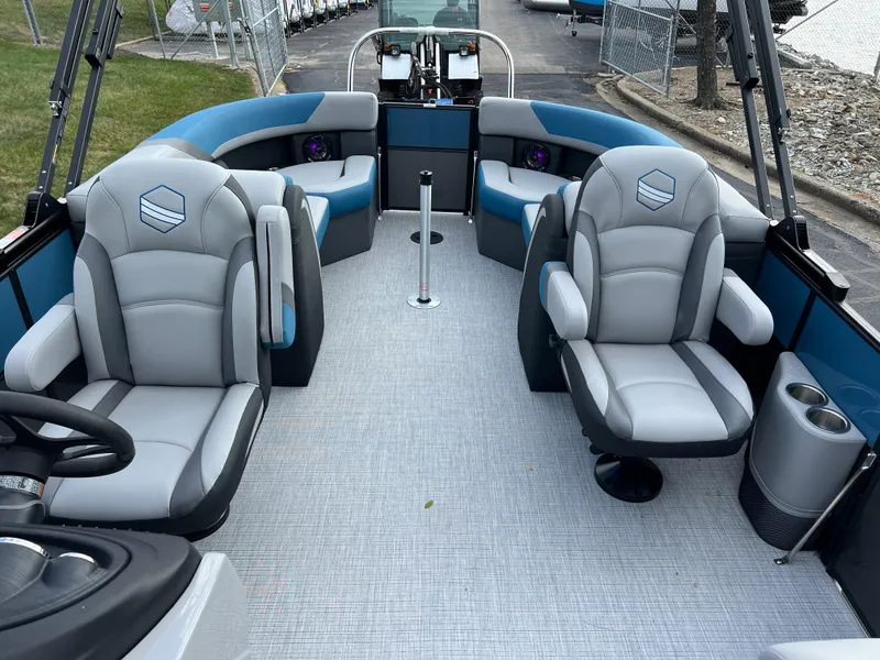 Slide: The Image of 2025 South Bay SS222 RS pontoon boat interior with plush seating and modern design. - 12