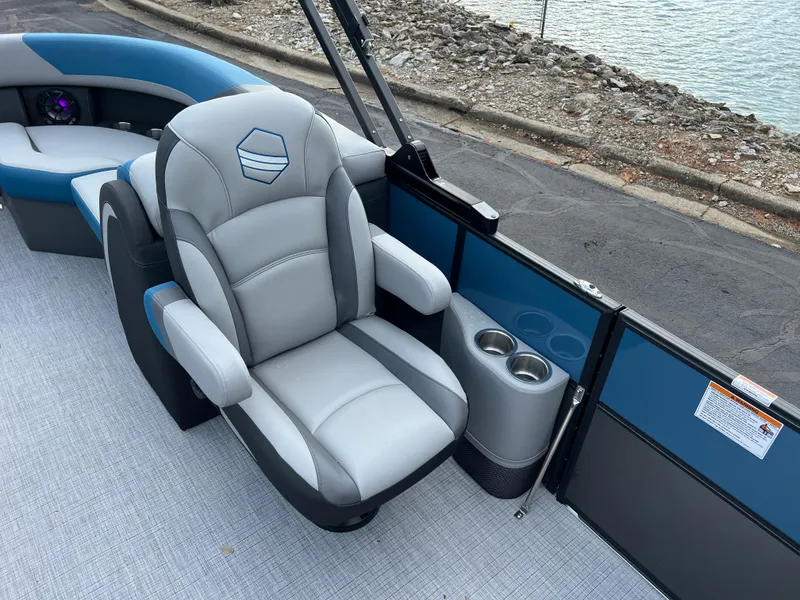 Slide: The Image of Luxurious seating on 2025 South Bay SS222 RS pontoon boat with cup holders. - 13