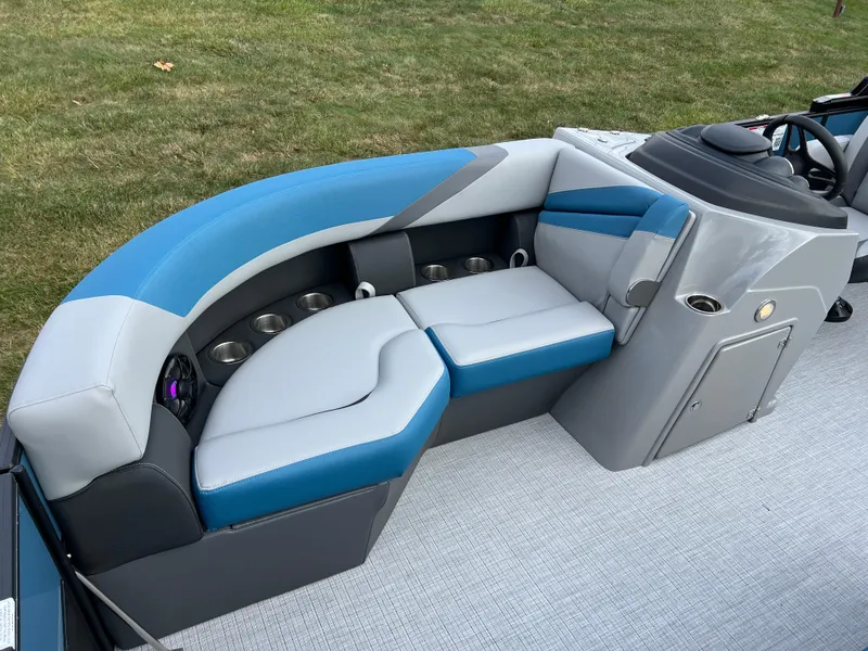 Slide: The Image of 2025 South Bay SS222 RS boat interior with blue and gray seating. - 9