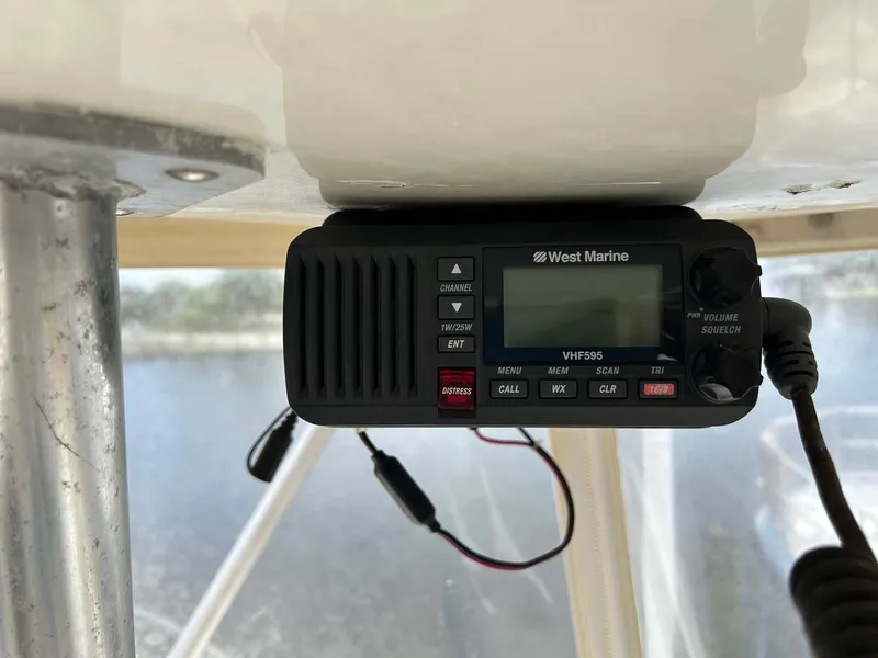 Slide: The Image of West Marine VHF radio installed on a 1975 Hatteras 36 Convertible boat. - 46