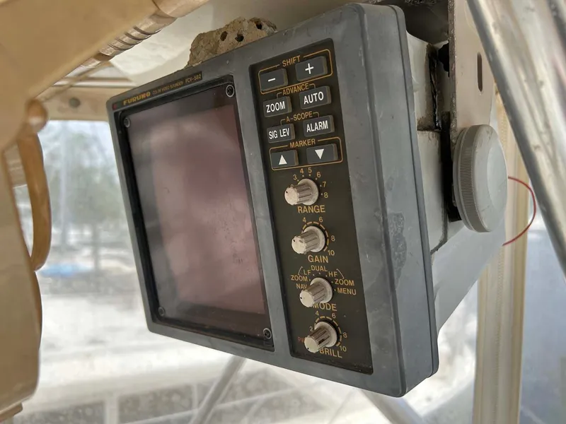 Slide: The Image of Vintage marine radar display on 1975 Hatteras 36 Convertible boat. - 47