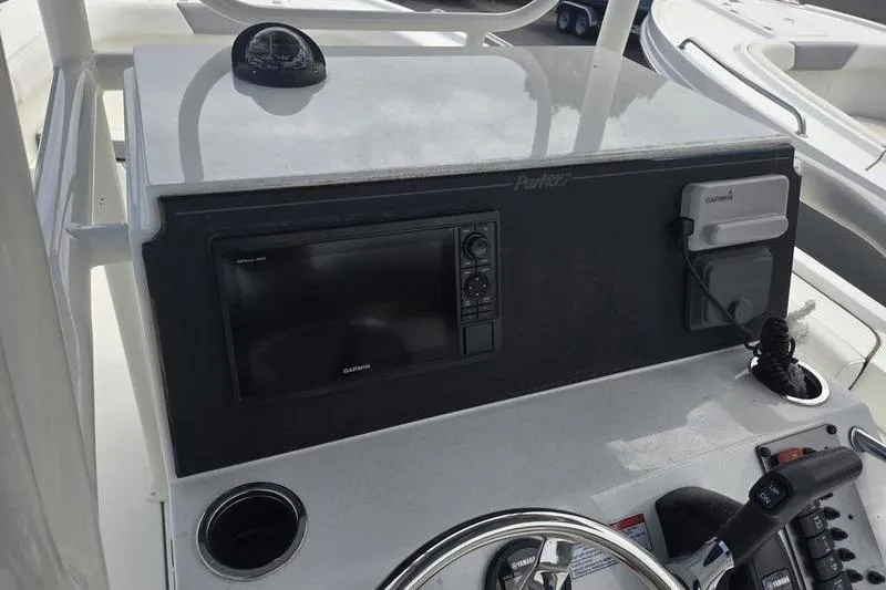 Slide: The Image of Control panel of 2025 Parker 23 SE CC boat with Garmin navigation system. - 11