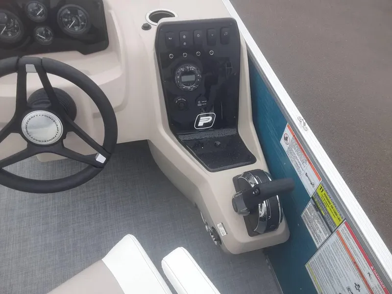 Slide: The Image of 2024 Princecraft Vectra 21 RL boat dashboard and steering wheel. - 5