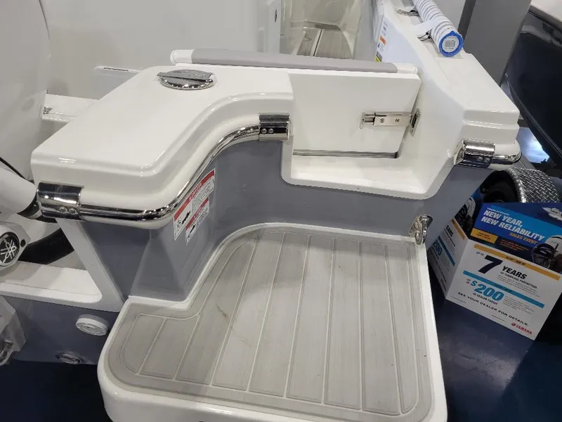 Slide: The Image of 2025 Parker 2200 CC boat deck with sleek white finish and modern design. - 8