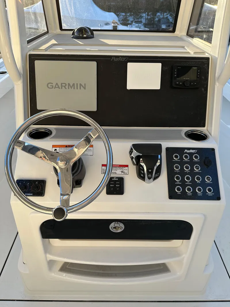 Slide: The Image of Center console of 2025 Parker 2200 CC boat with Garmin navigation system. - 12