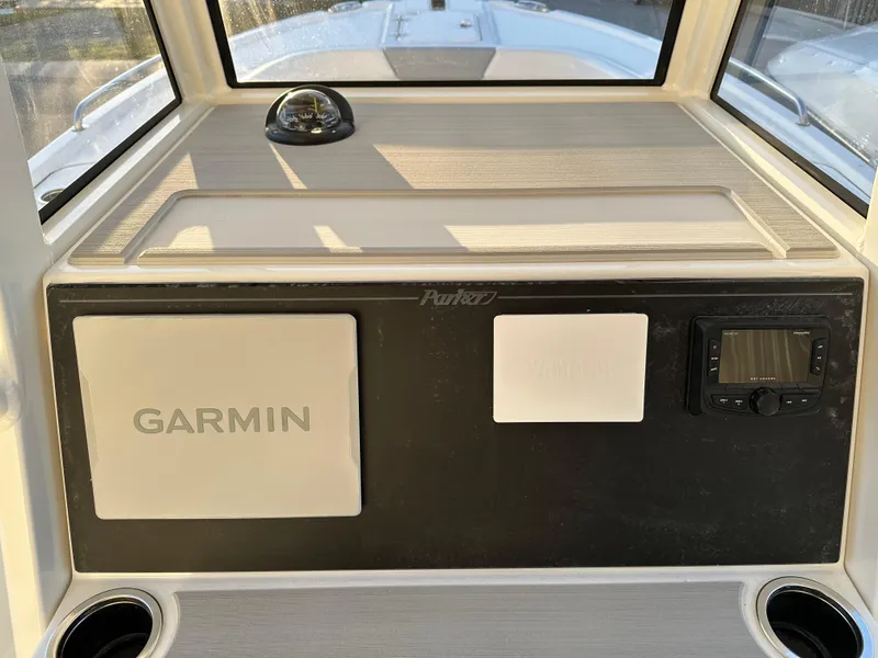 Slide: The Image of Parker 2200 CC 2025 boat dashboard with Garmin navigation system. - 14