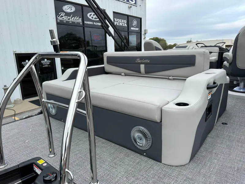 Slide: The Image of 2025 Barletta C24UC pontoon boat with luxurious seating and modern design. - 10