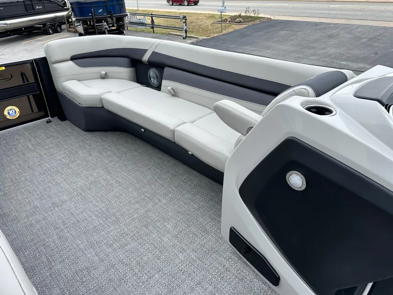 Slide: The Image of 2025 Barletta C24UC pontoon boat interior with sleek seating and modern design. - 23