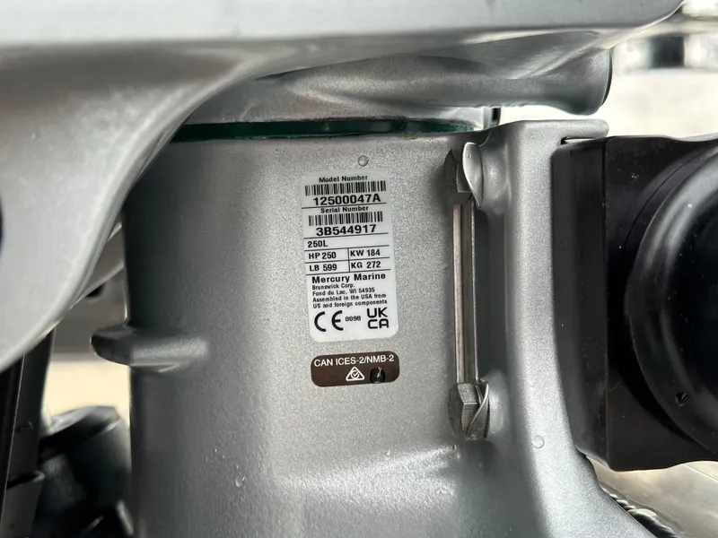 Slide: The Image of Close-up of Mercury Marine engine label on 2025 Barletta C24UC boat. - 28