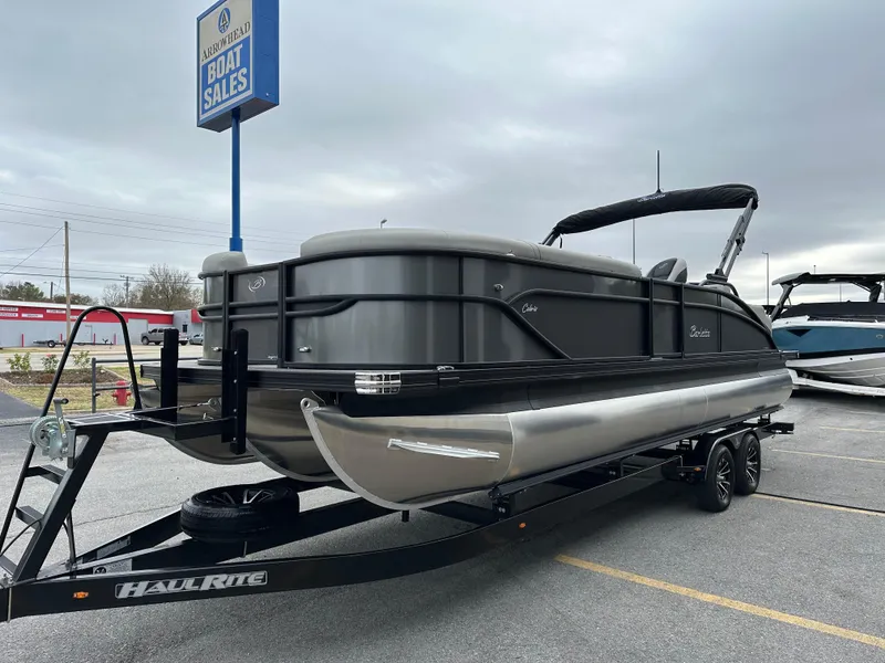 Slide: The Image of 2025 Barletta C24UC pontoon boat on trailer at Arrowhead Boat Sales. - 5
